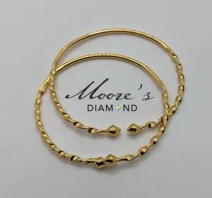 10k Baby pair Traditional West Indian Bangles with twist