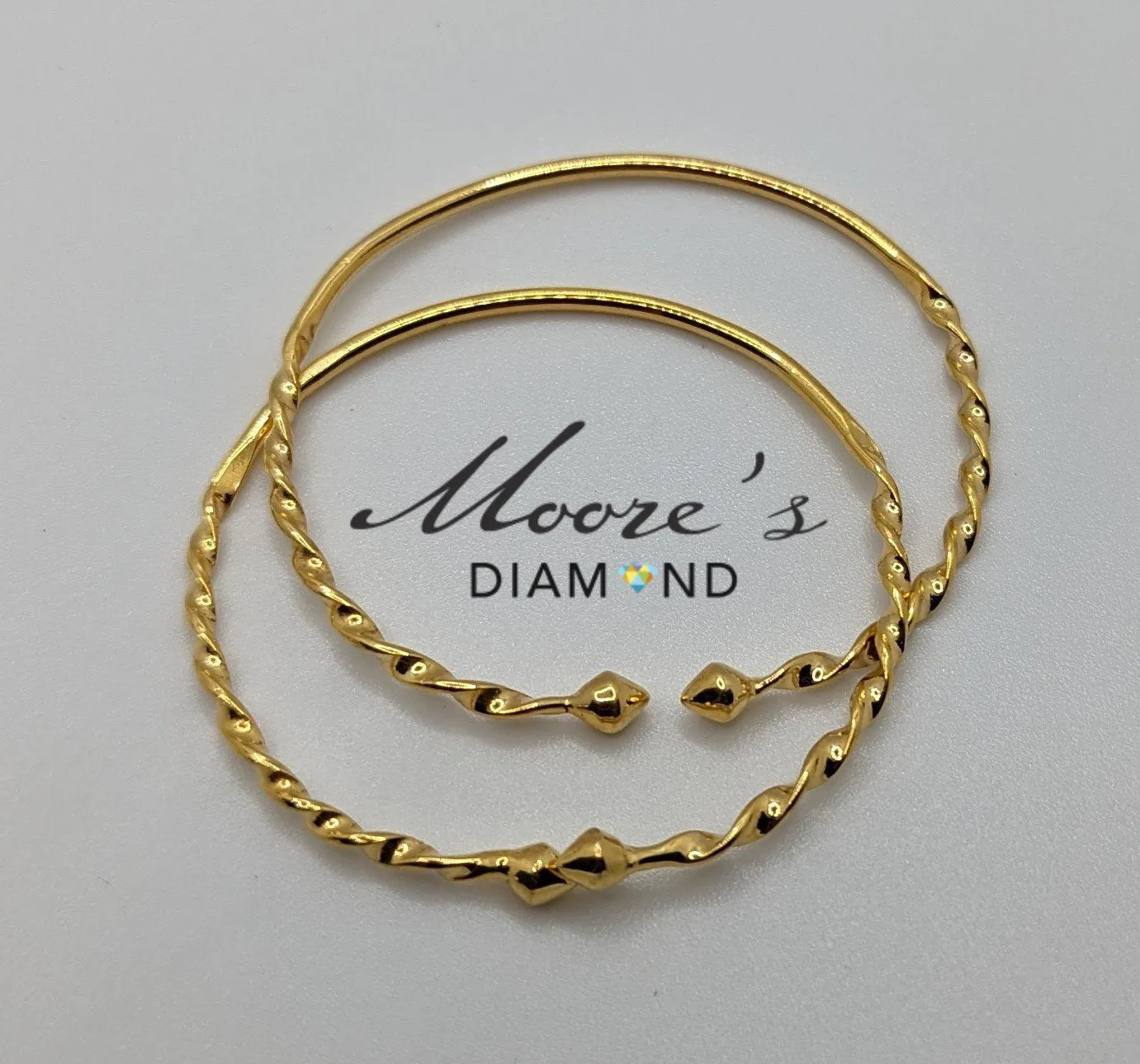 10k Baby pair Traditional West Indian Bangles with twist
