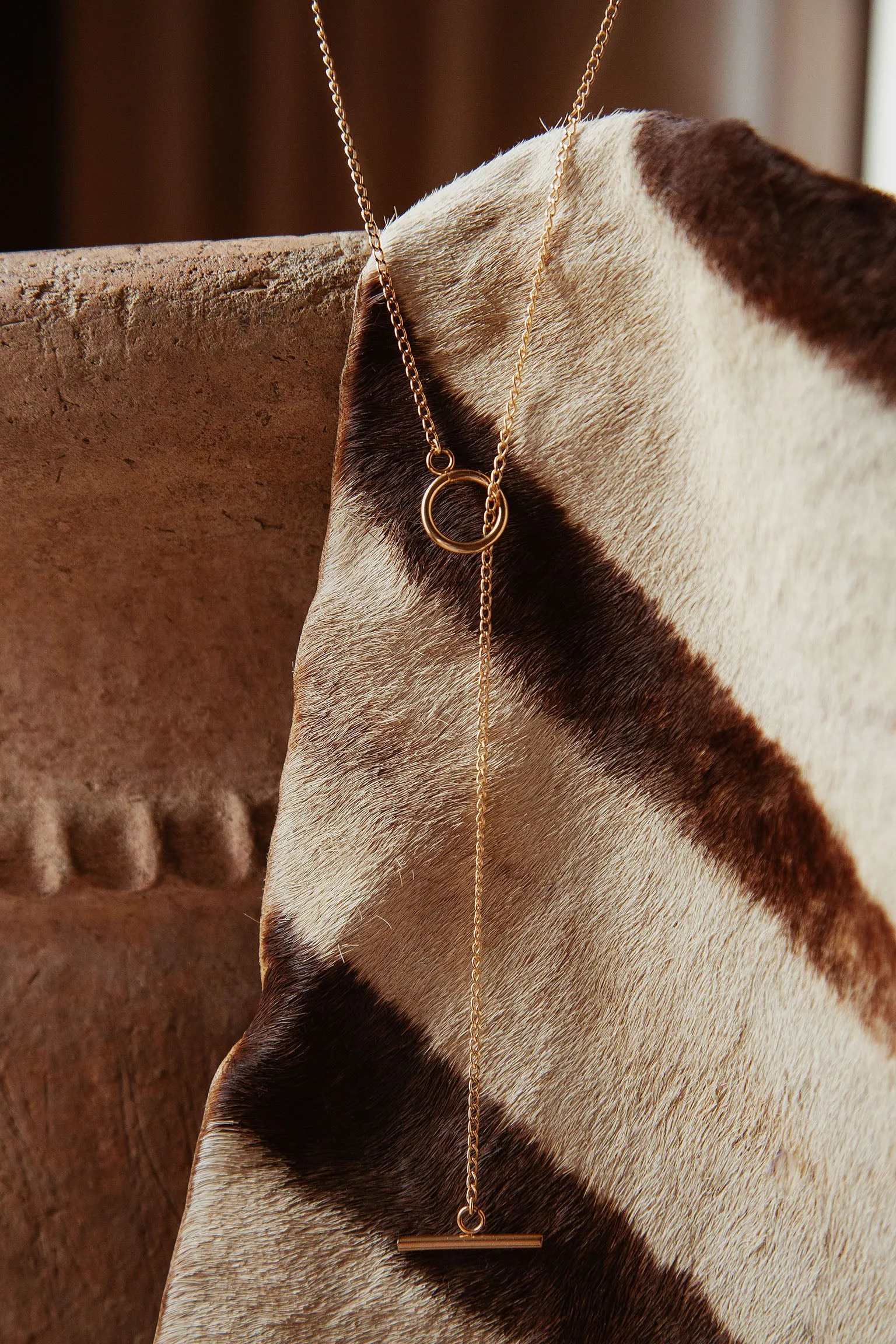 Gold lariat necklace