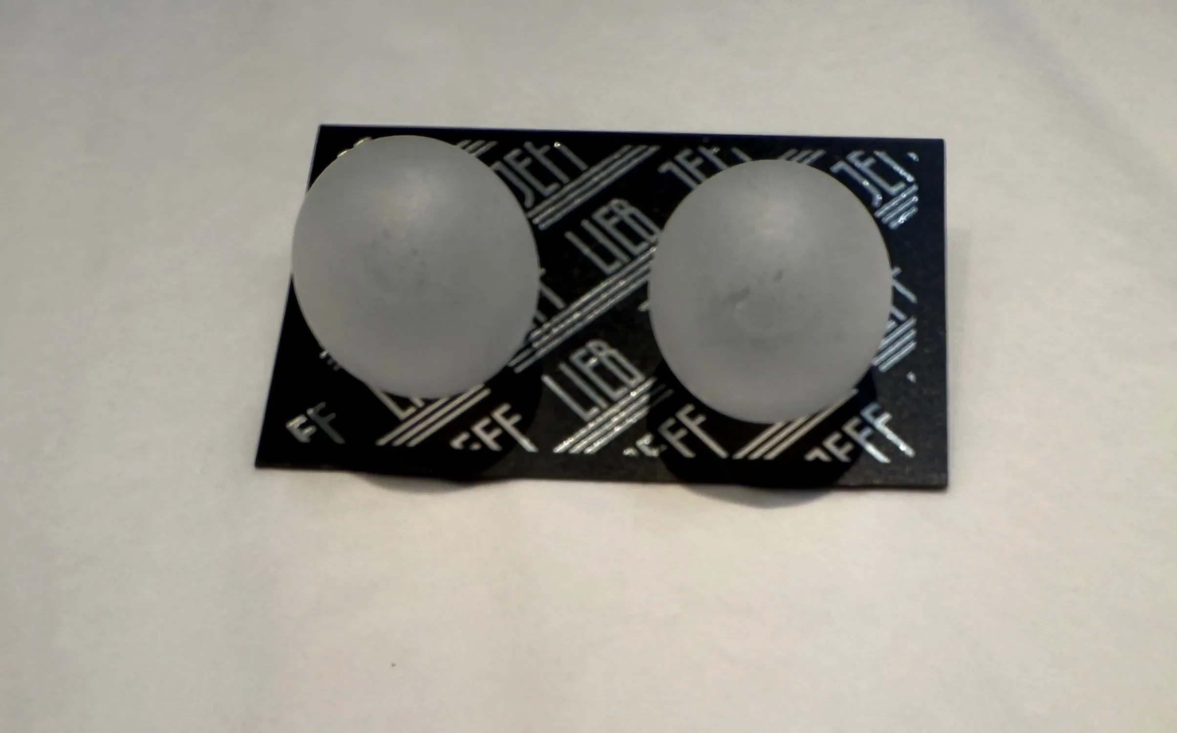Ice Ball Clip On Earrings by Jeff Lieb
