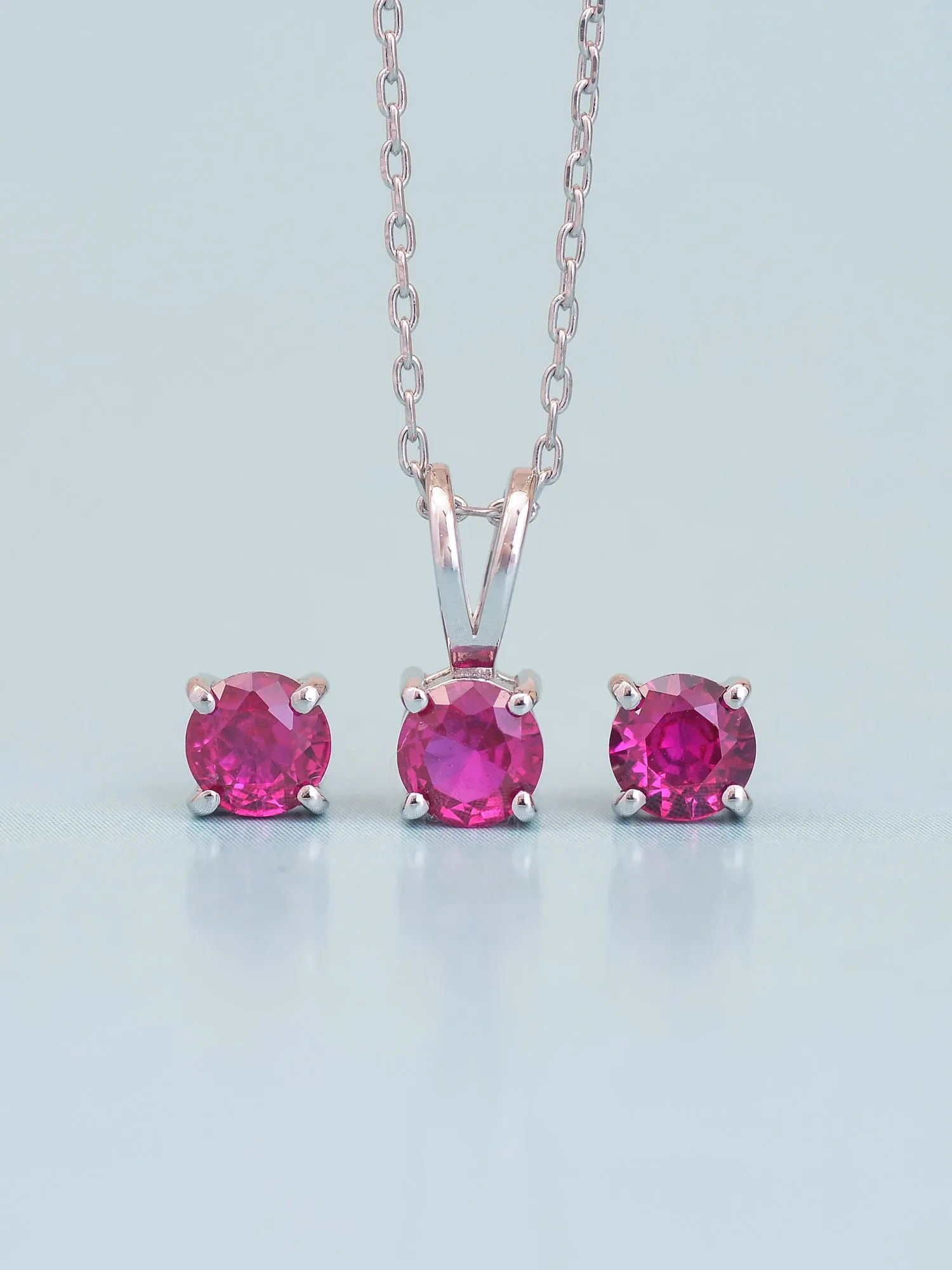 Ornate Jewels Ruby Solitaire Necklace With Earrings