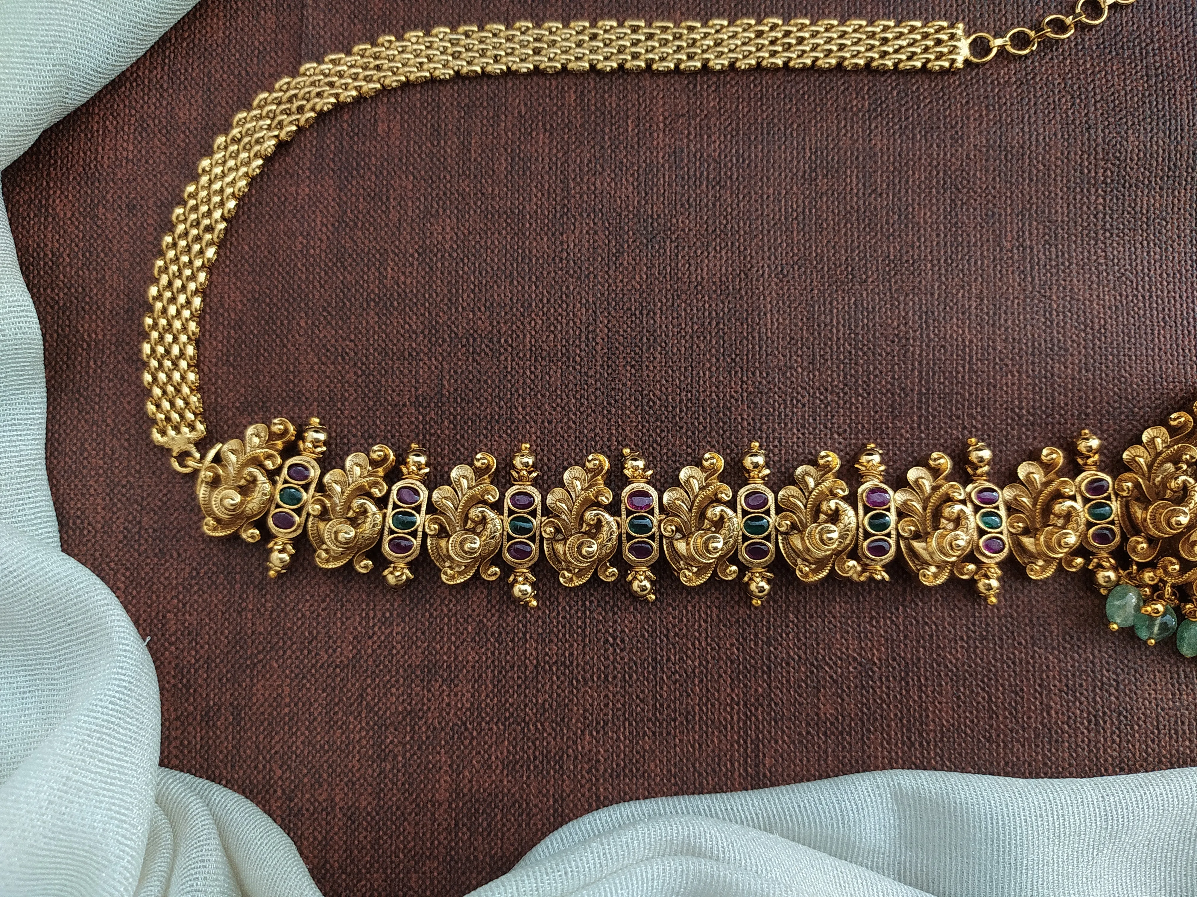 Regal Antique Lakshmi Hip-Chain with Nakshi Work, Peacock Design, and Kemp & Green Stones