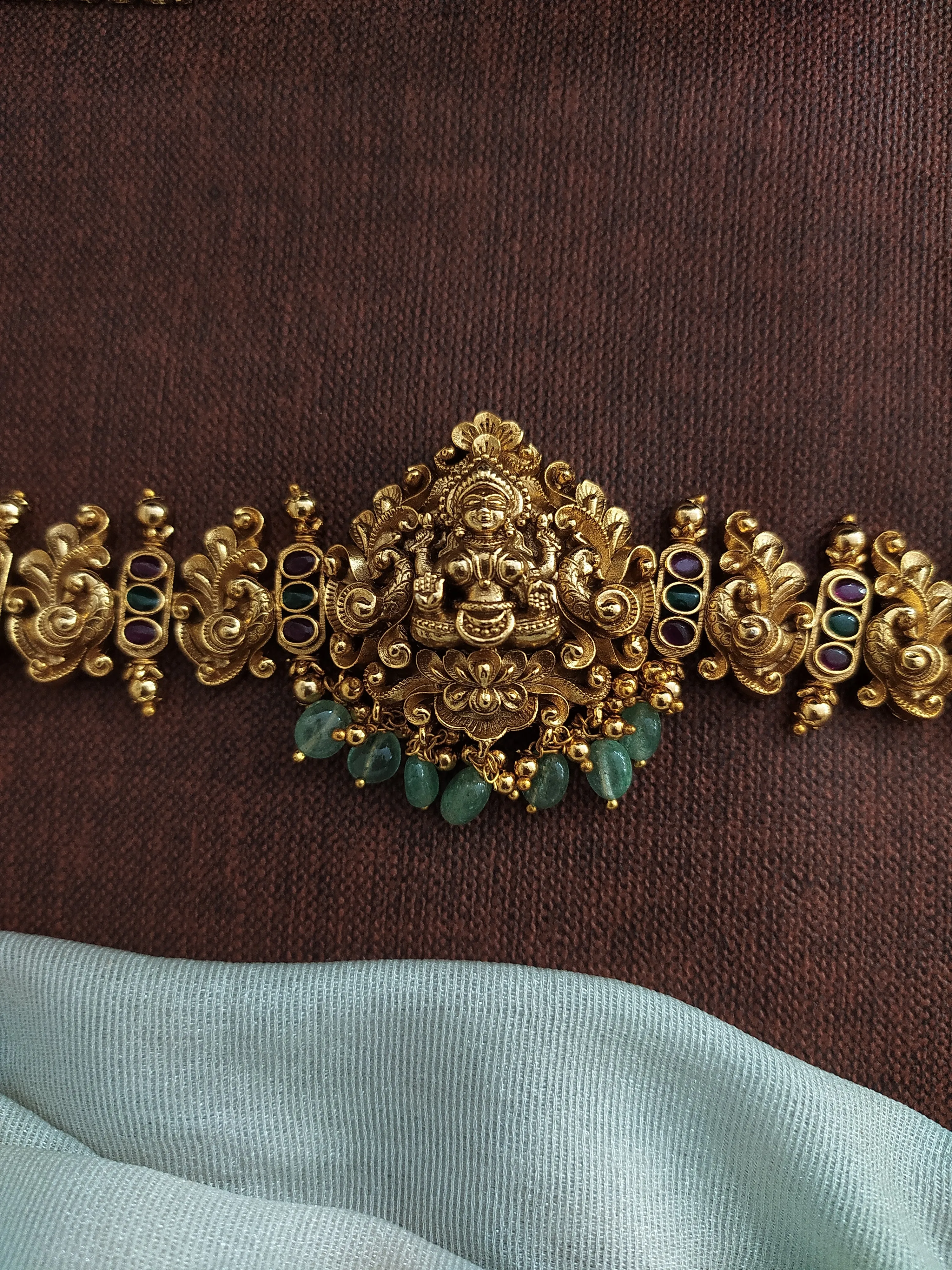 Regal Antique Lakshmi Hip-Chain with Nakshi Work, Peacock Design, and Kemp & Green Stones